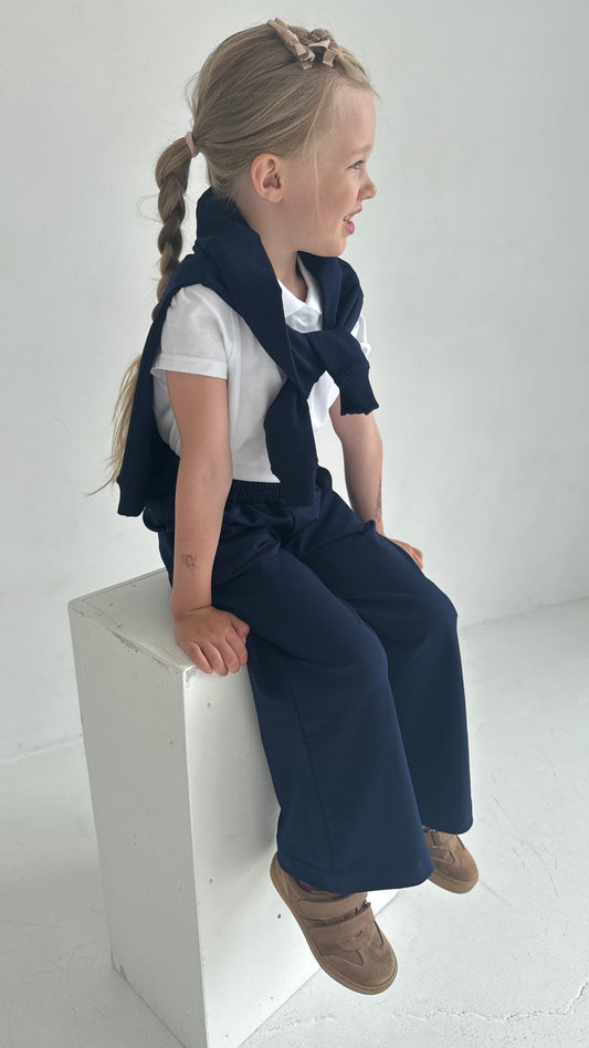 Plačios trikotažinės kelnės mergaitei